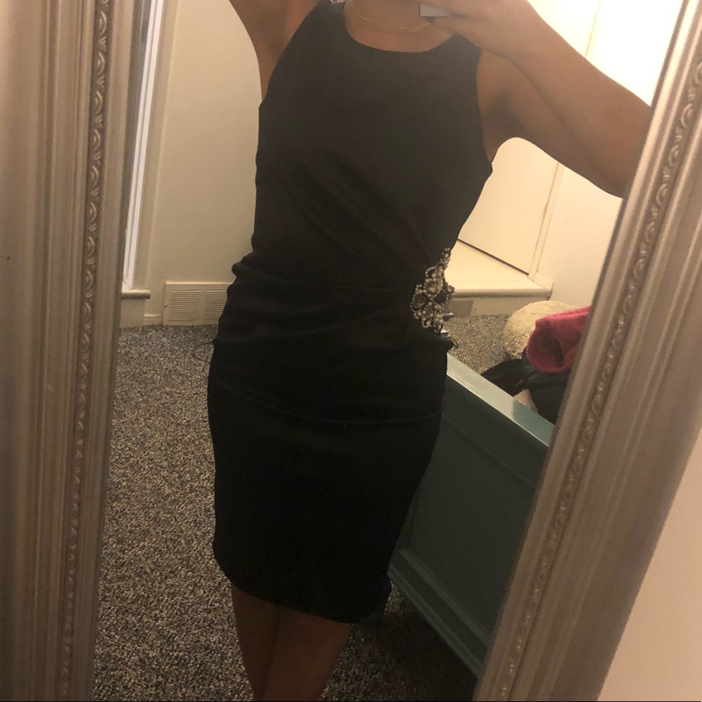 A Satin Midi dress with beaded design on right.